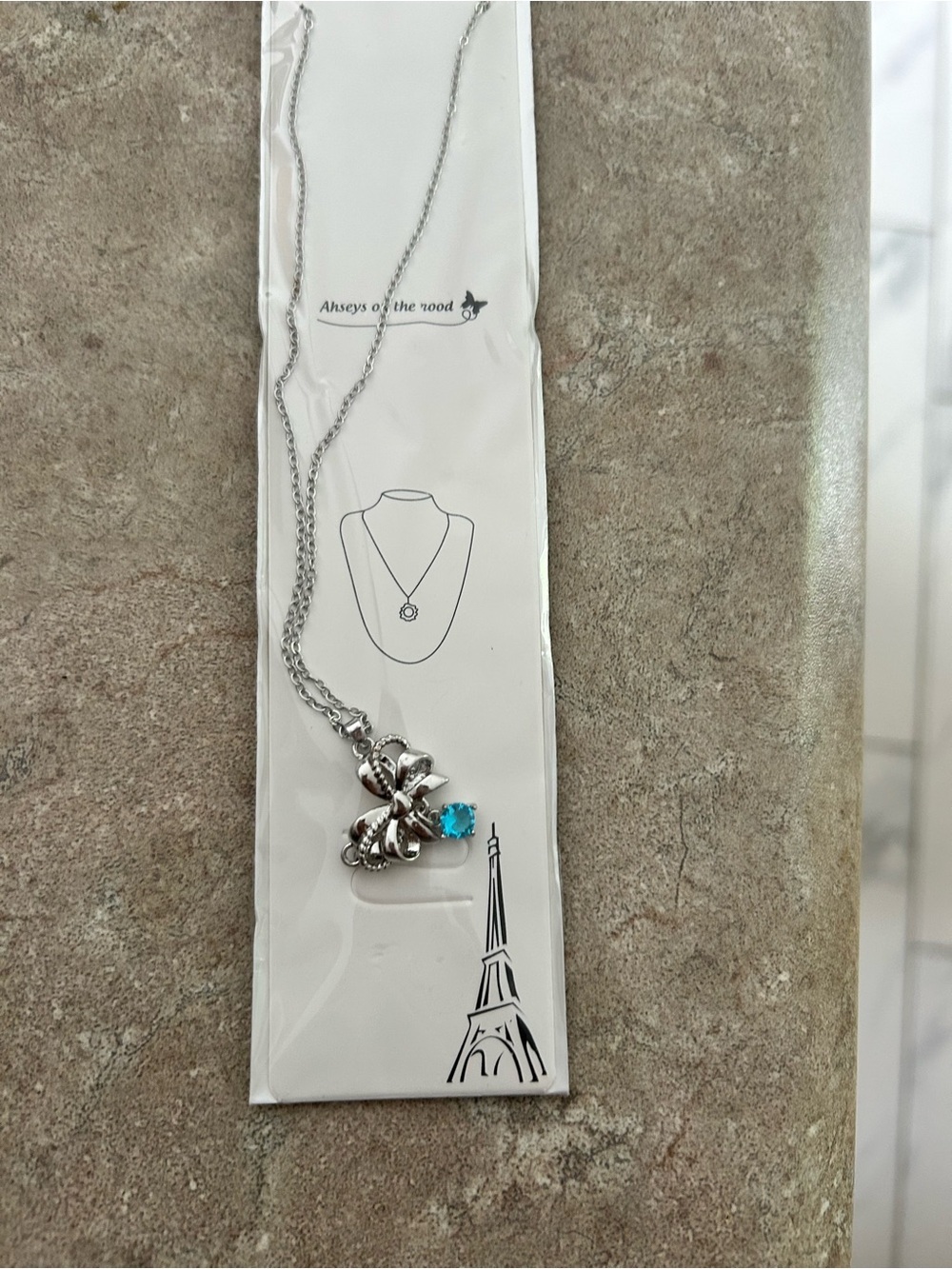 4/!50 Silver Flower Pendant Necklace with Blue Gem